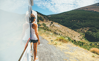 girl-enjoys-the-view-on-a-motor-home-2024-09-23-03-32-05-utc