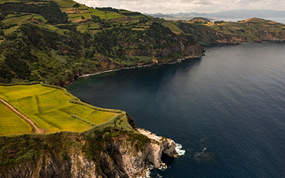 picturesque-coastline-landscape-with-green-hills-2025-03-18-13-56-42-utc